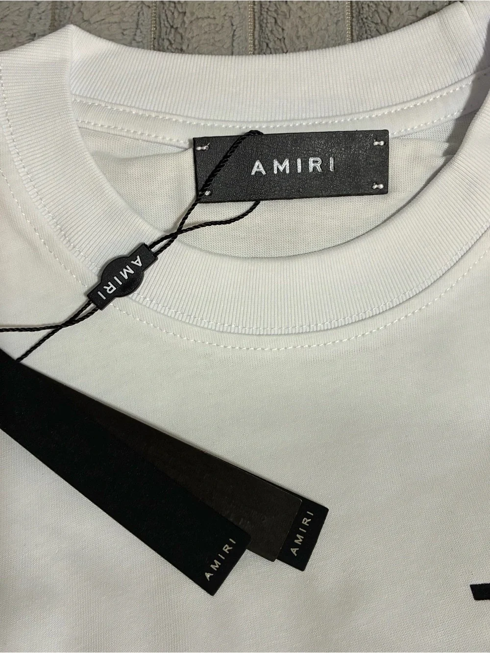 AMIRI White Tee with Large Black Logo Print